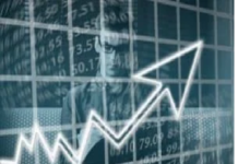 A person is looking at a large graph with an upward arrow overlay on a background of stock market numbers. Human Nature