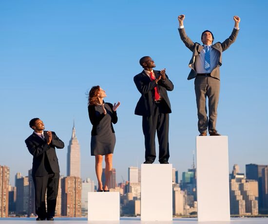 Against a city skyline backdrop, four people in business attire stand on podiums, embodying wealth and power. One man raises his arms in victory, channeling the indomitable spirit of John D. Rockefeller.