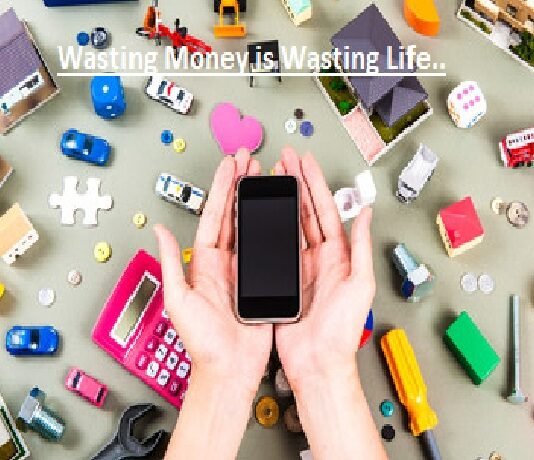 Hands holding a smartphone surrounded by toy houses, cars, tools, coins, and a calculator, with the text "Wasting Money is Wasting Life" above.