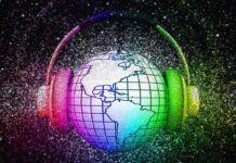 A globe with grid lines is encircled by headphones. The image is surrounded by a colorful, glittery background. The world is listening.