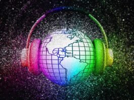 A globe with grid lines is encircled by headphones. The image is surrounded by a colorful, glittery background. The world is listening.