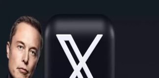 Elon Musk stands next to a large black square with a white "X" symbol, with the word "XMAIL" below.