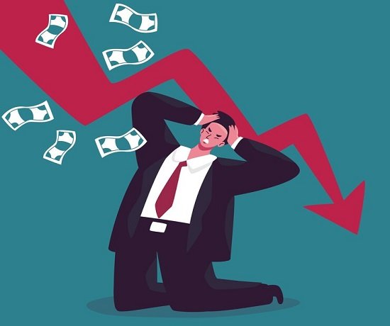 An illustration of a worried man in a suit kneeling with hands on his head. A red downward graph arrow and floating money highlight financial distress, reflecting challenges in the banking sector.